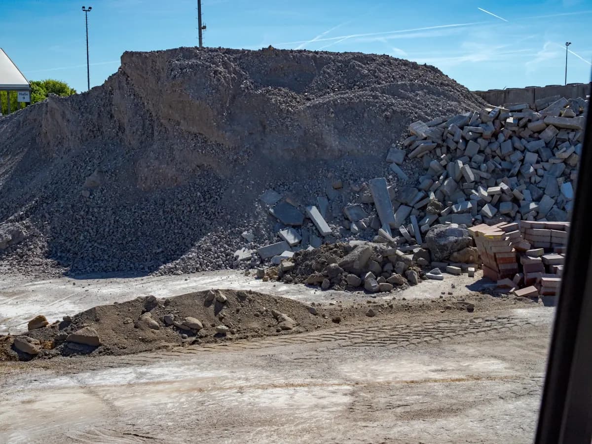 Pile of tile and construction debris from a bathroom tear-out in Menifee, California