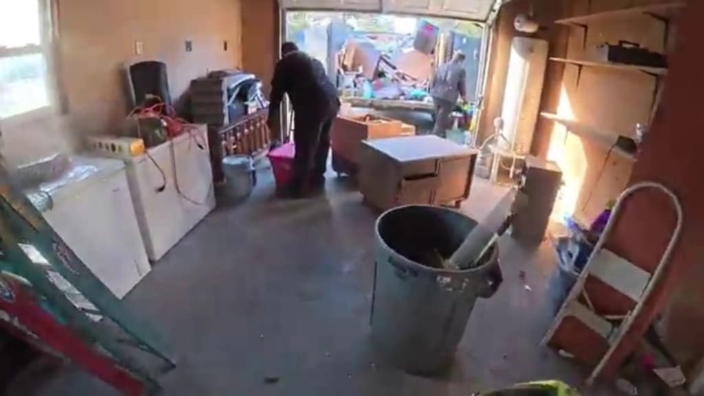 Washer and dryer being cleared from a Hemet garage